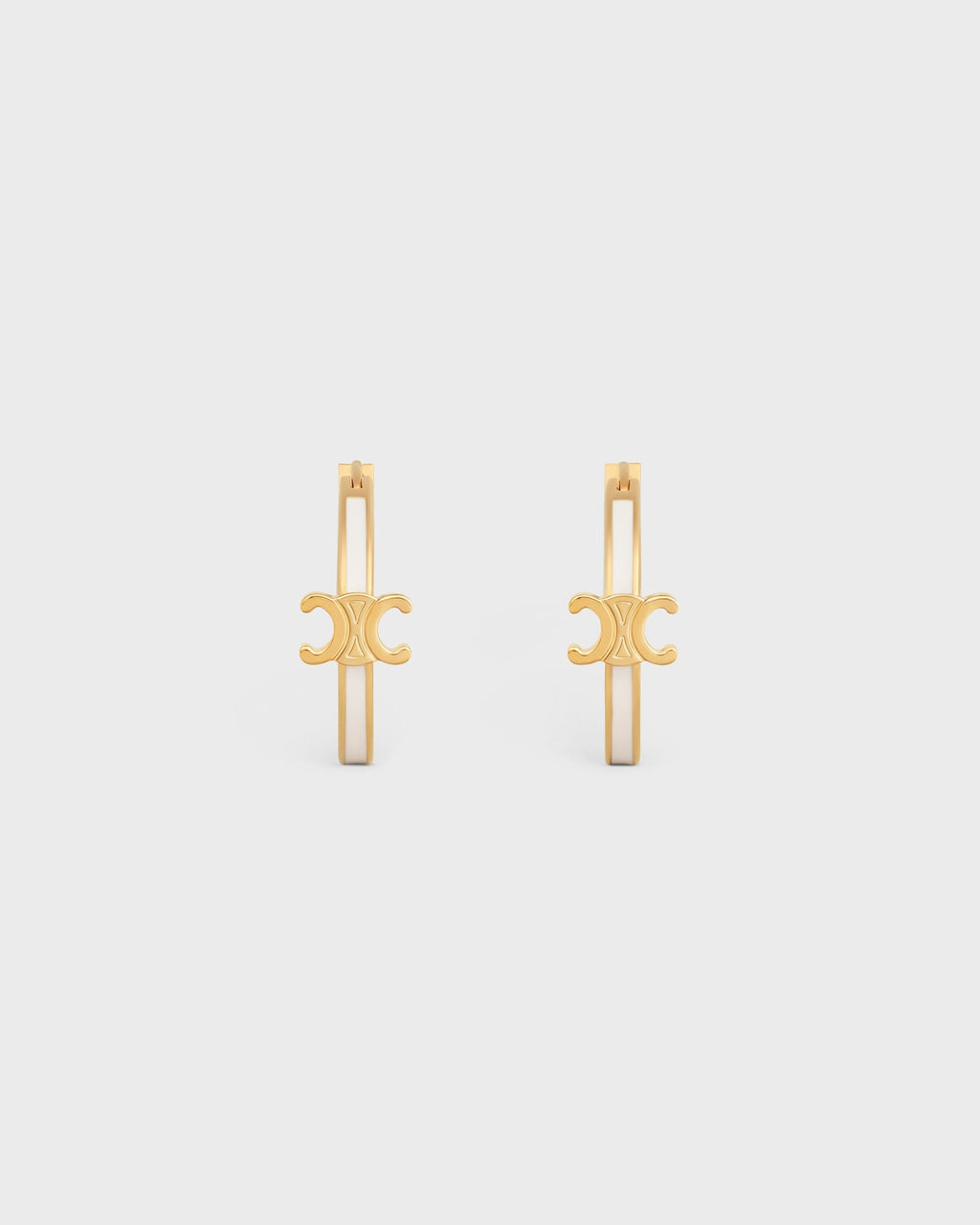 Celine triomphe hoops in enamel and brass with gold finish