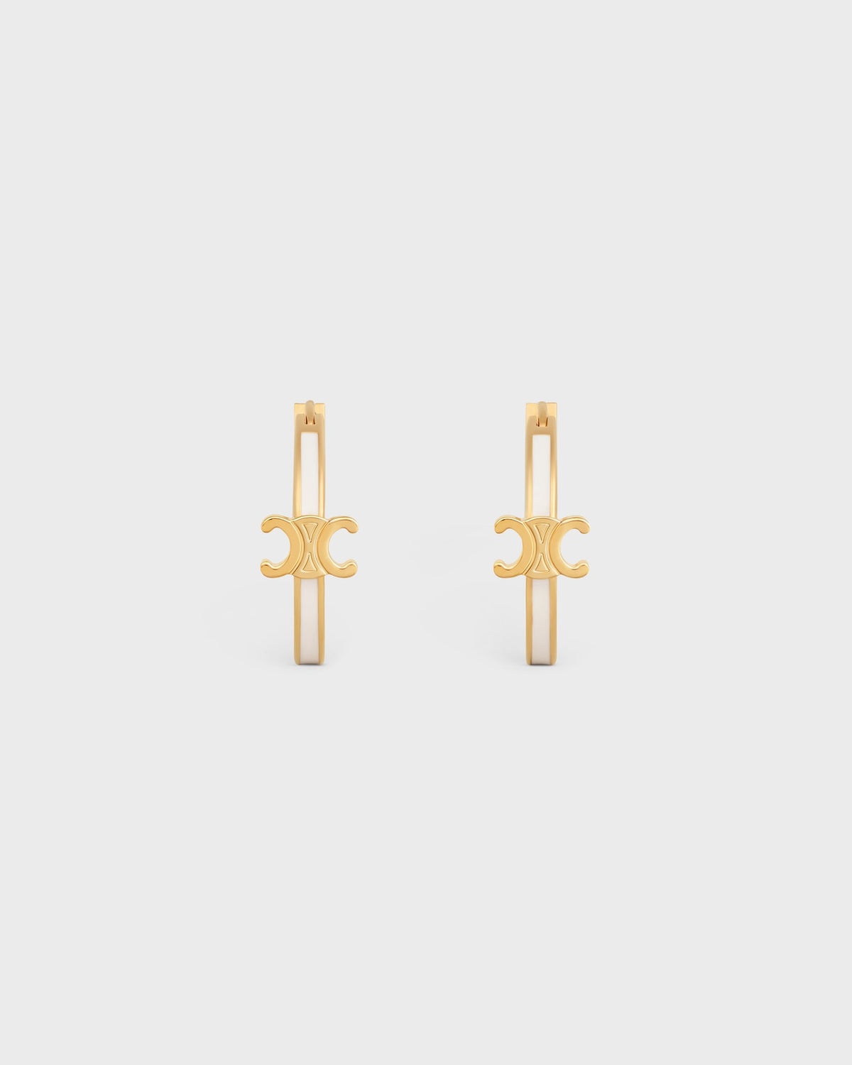 Celine triomphe hoops in enamel and brass with gold finish