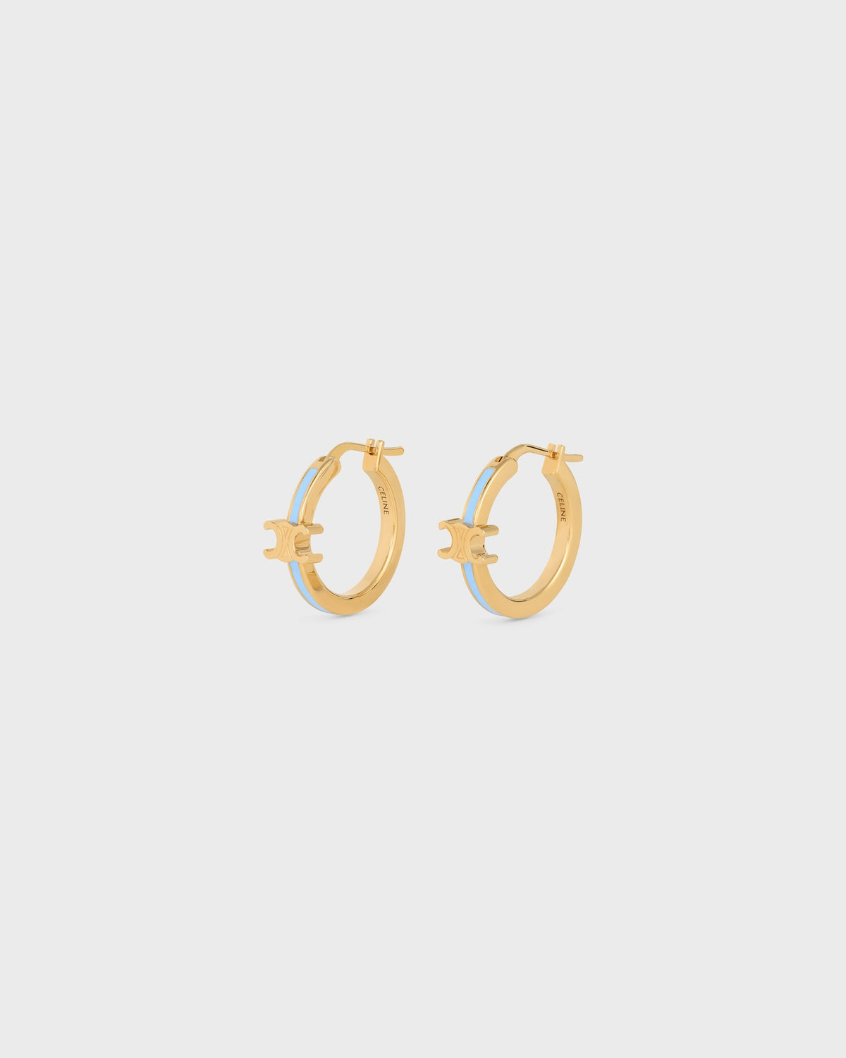 Celine triomphe hoops in enamel and brass with gold finish