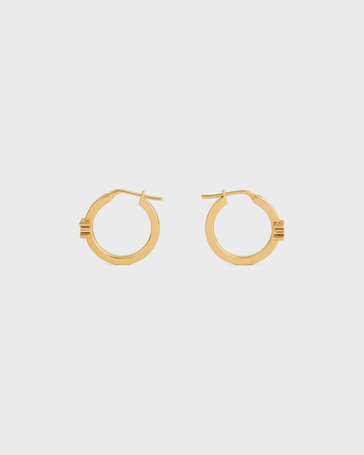 Celine triomphe hoops in enamel and brass with gold finish