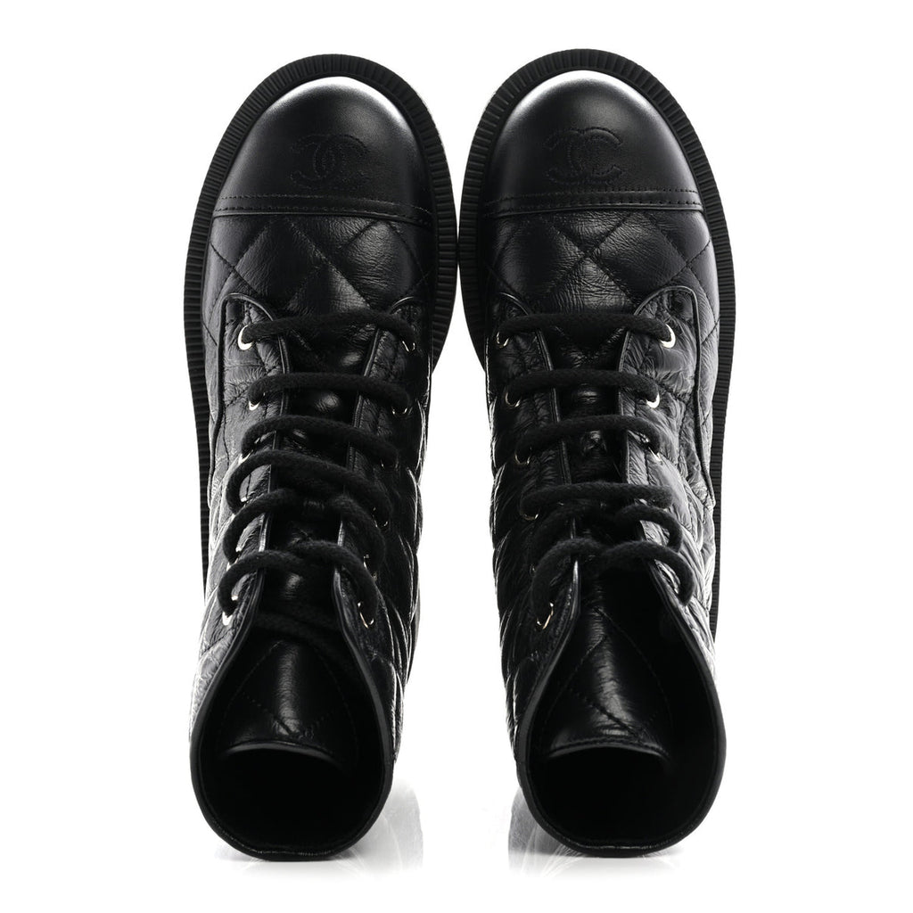 Chanel quilted combat boots