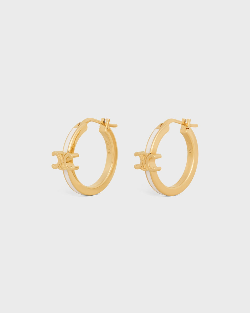 Celine triomphe hoops in enamel and brass with gold finish