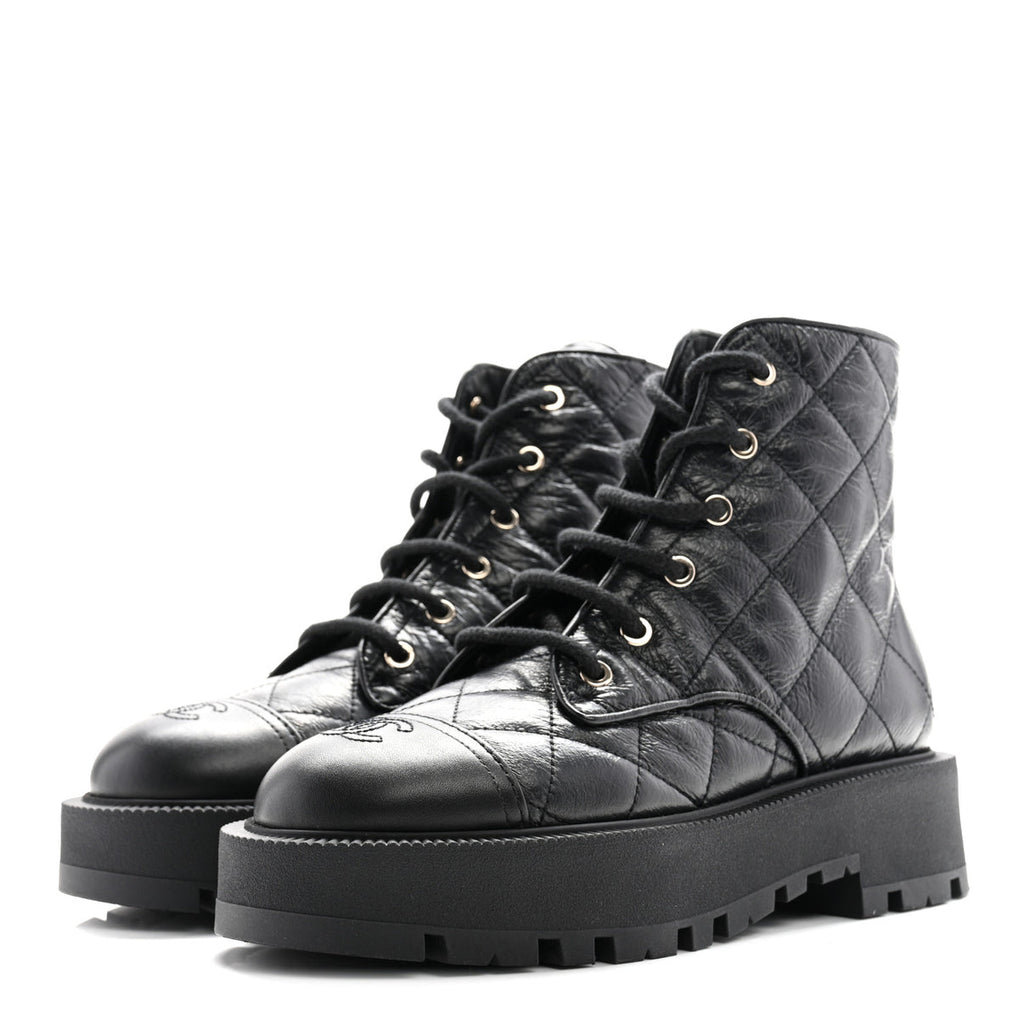 Chanel quilted combat boots