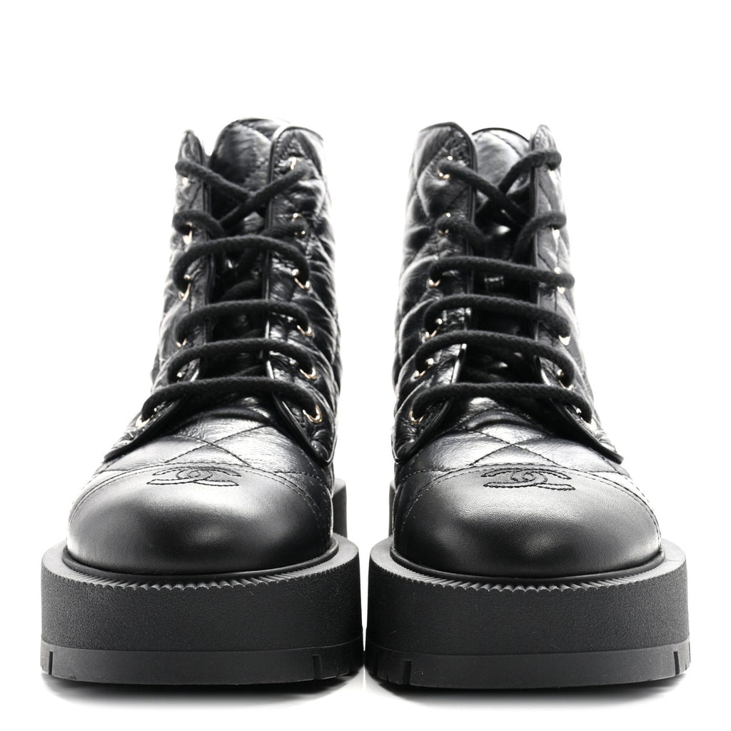 Chanel quilted combat boots
