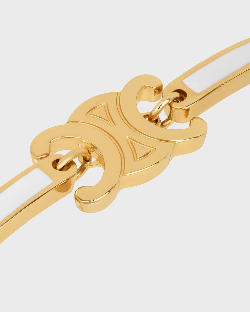 Celine triomphe articulated bracelet in enamel and brass with gold finish