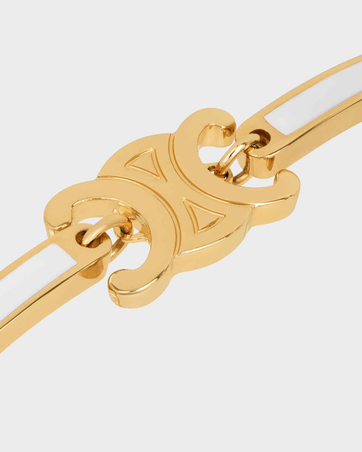 Celine triomphe articulated bracelet in enamel and brass with gold finish
