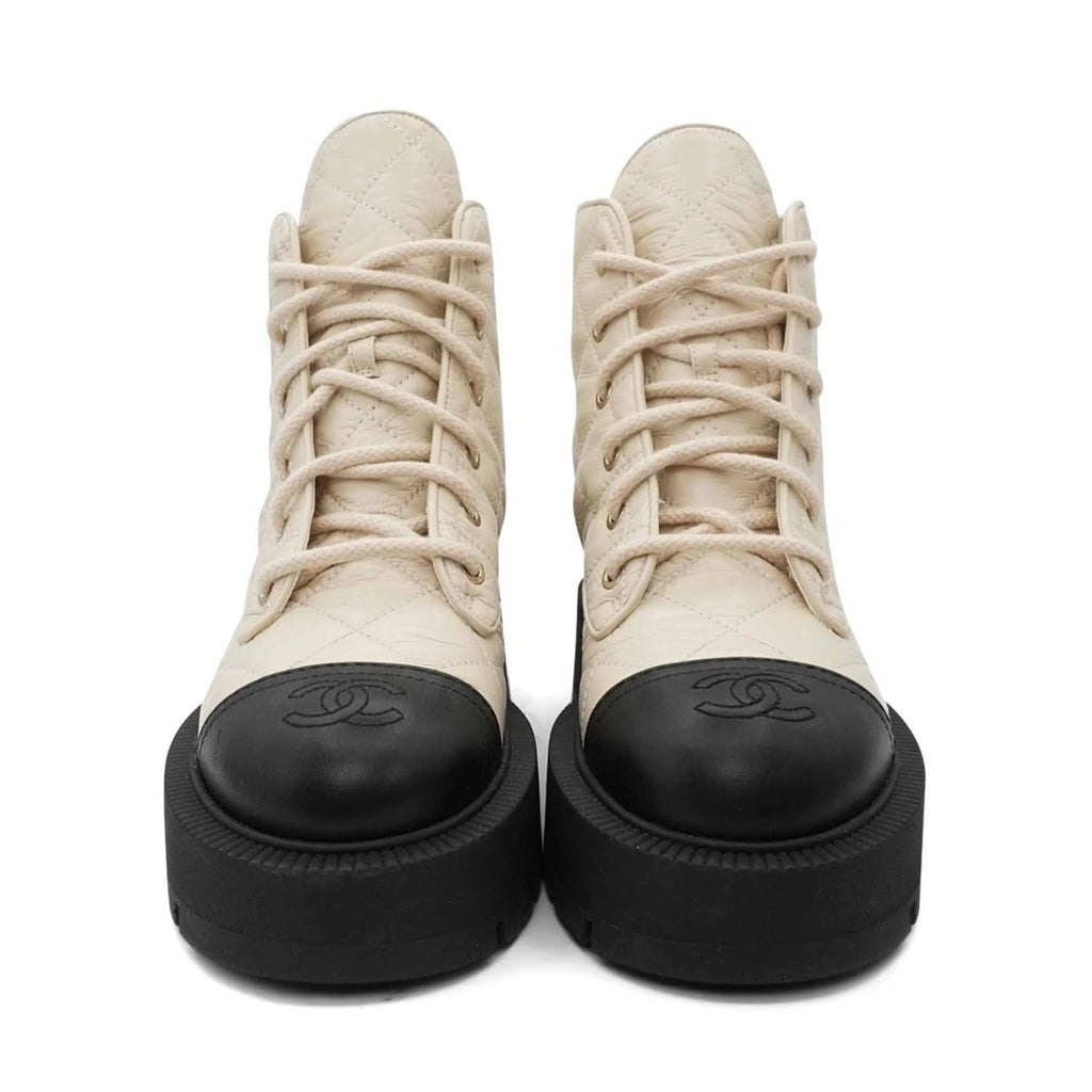 Chanel quilted combat boots