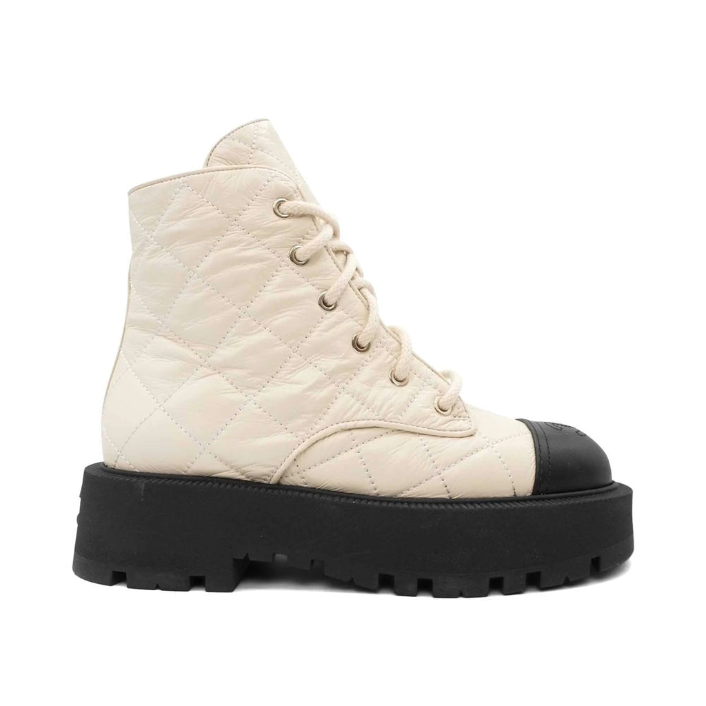 Chanel quilted combat boots