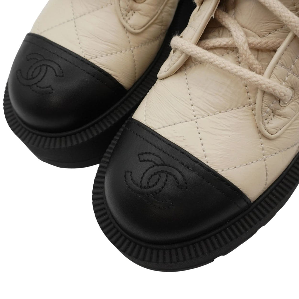 Chanel quilted combat boots