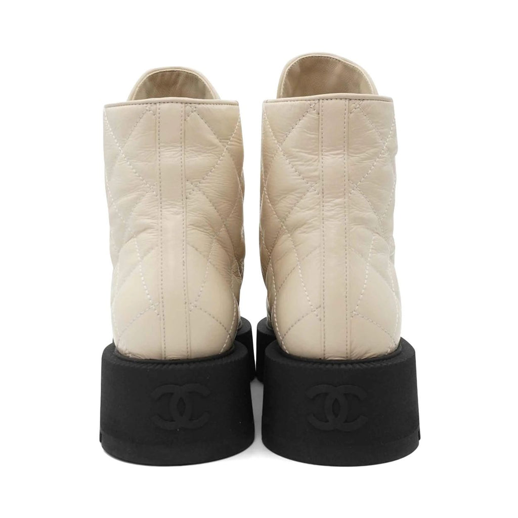 Chanel quilted combat boots
