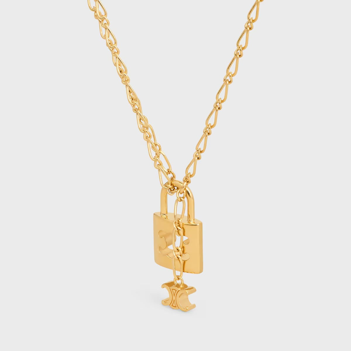 Celine triomphe lock necklace in brass with gold finish,Celine triomphe lock necklace,Celine triomphe lock necklace gold,Celi