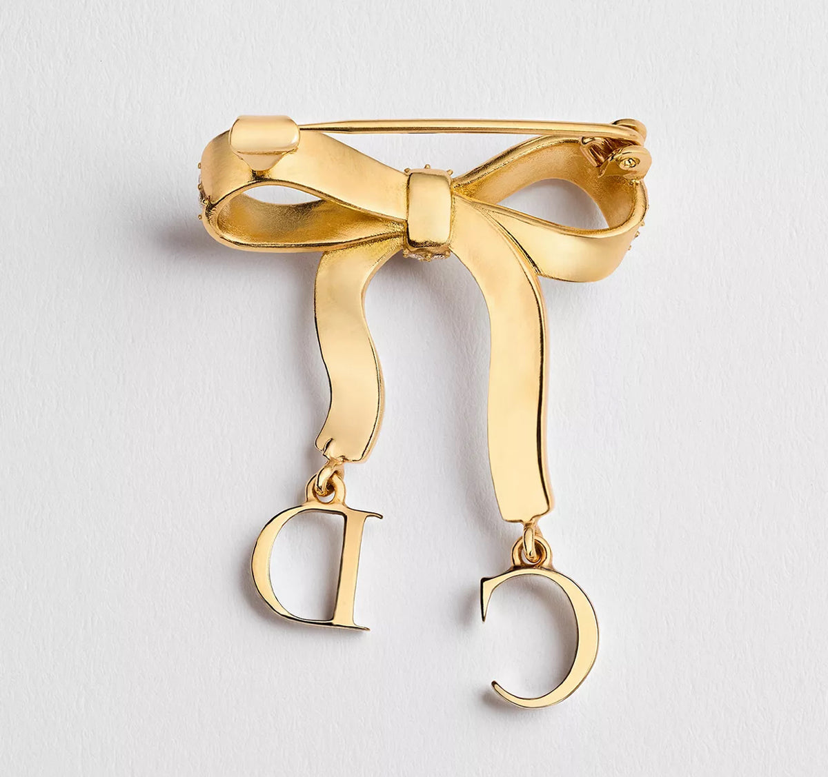 Winniemodo,Winniemodony,Dior V1975WOMCY,Dior brooch gold,Dior ribbon brooch,Dior brooch rhinestone,Dior brooch gold sale,Dior