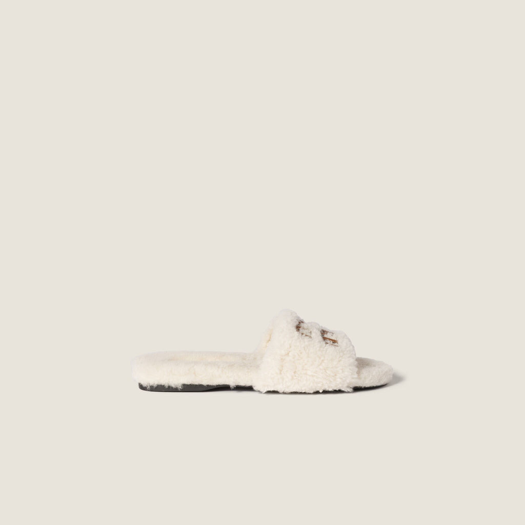Winniemodo,Winnie modo,MIU MIU 5XX664,MIU MIU shearling slippers,Miu Miu shearling slides,MIU MIU slippers fur,MIU MIU slippe