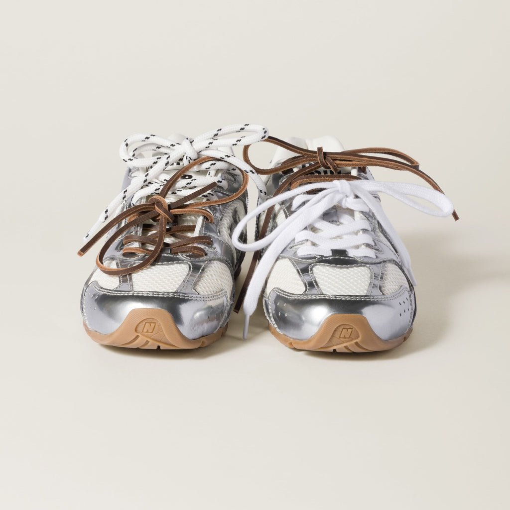 MIU MIU 5E165E,Miu Miu 530SL New Balance metallic sneaker,MIU MIU New Balance silver sneaker,MIU MIU new balance 530sl,New ba