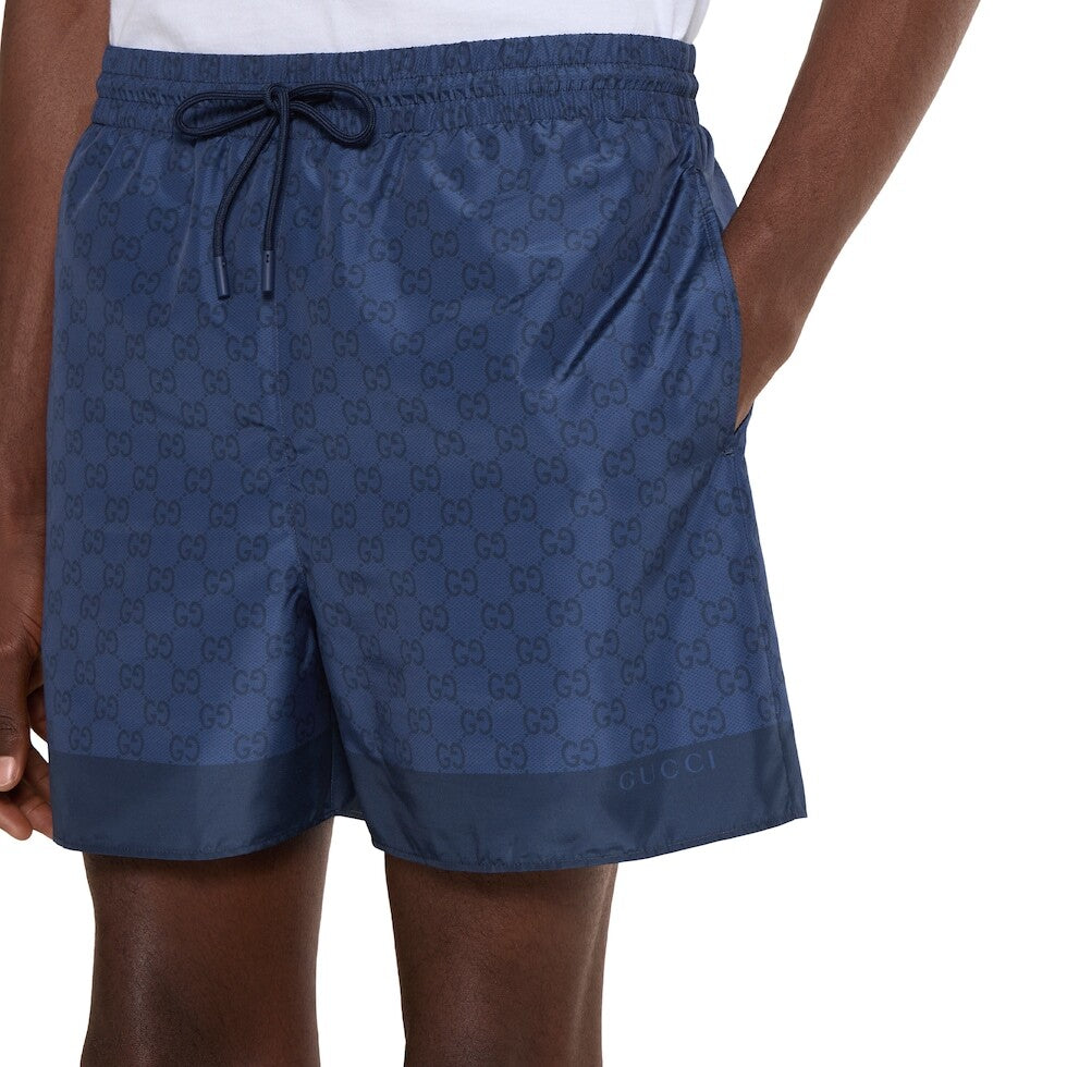 Gucci 833310 XHAKR,Gucci GG printed swim shorts,Gucci blue monogram swim shorts,Gucci blue swim shorts,Gucci swim shorts,Gucc