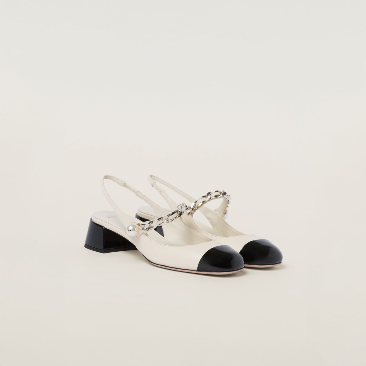 Winniemodo,Winnie modo,MIU MIU 5I045E,Miu Miu leather and patent slingback pumps,MIU MIU white slingback pumps,MIU MIU slingb