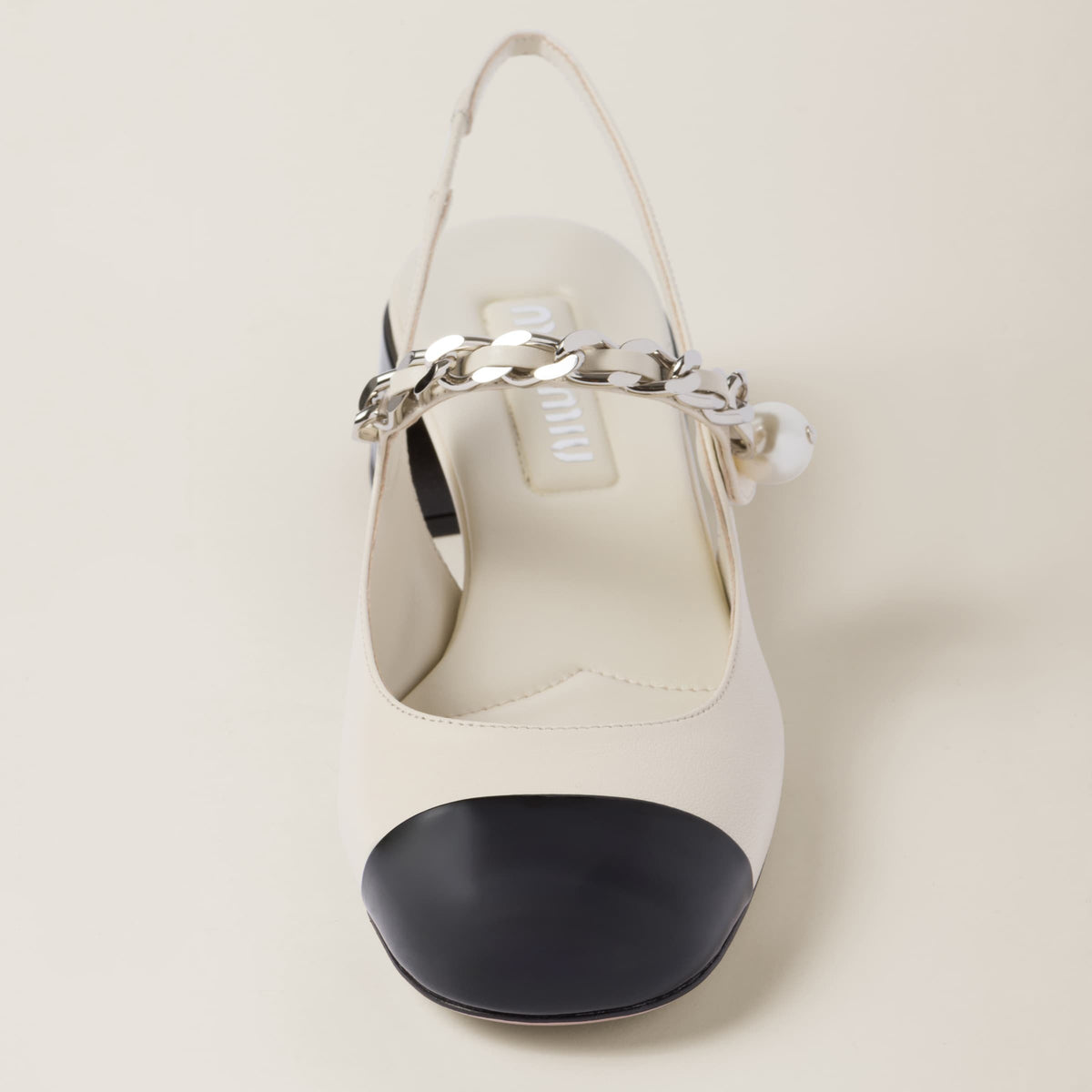 Winniemodo,Winnie modo,MIU MIU 5I045E,Miu Miu leather and patent slingback pumps,MIU MIU white slingback pumps,MIU MIU slingb