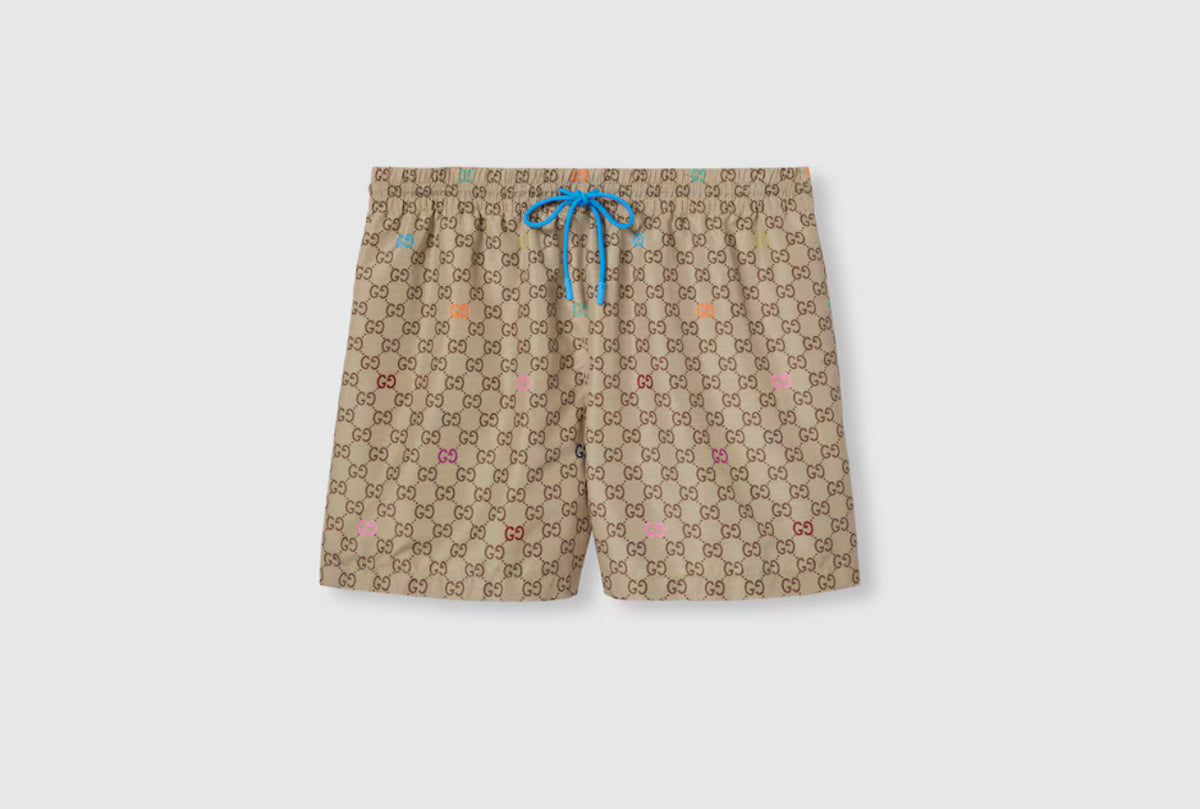 Gucci GG printed swim shorts,Gucci beige monogram swim shorts,Gucci brown swim shorts,Gucci swim shorts,Gucci swim shorts on