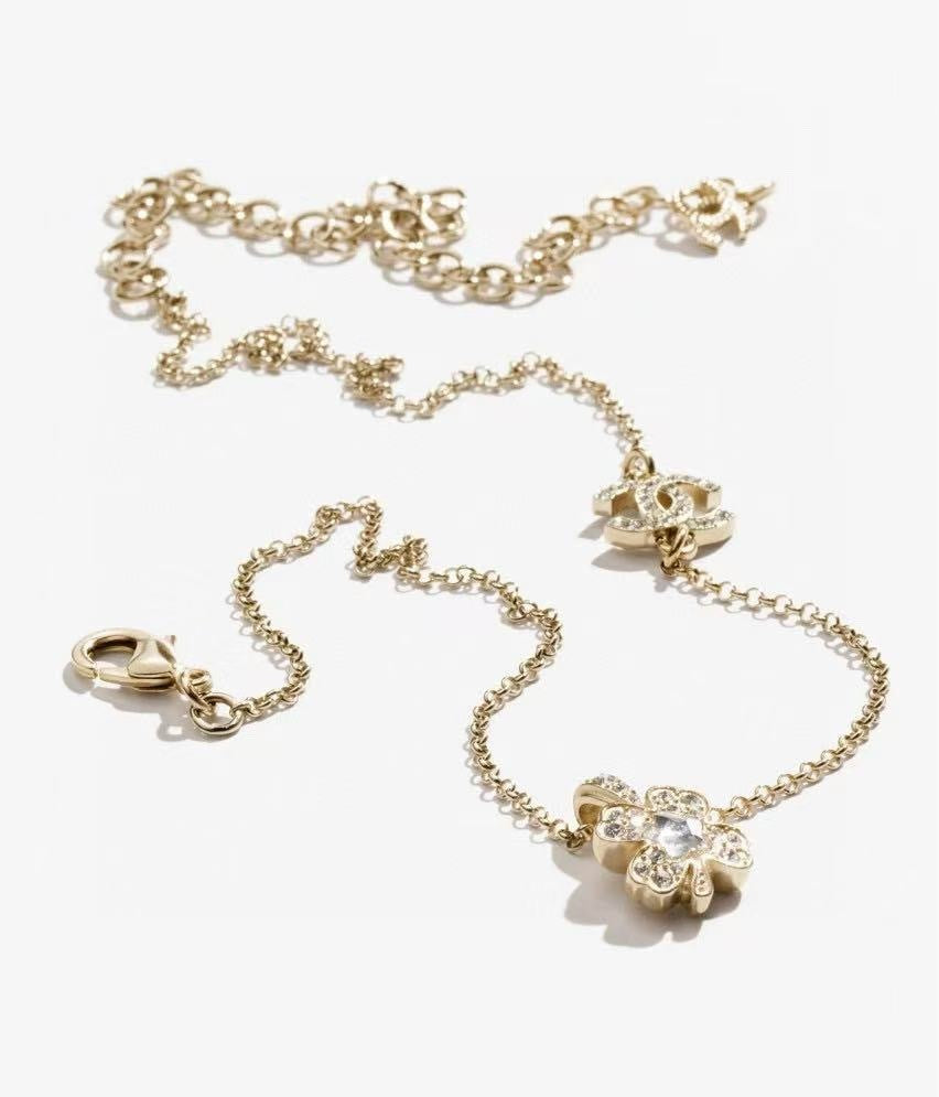 Chanel 25P pendant necklace,Chanel four leaf clover necklace,Chanel four leaf clover pendant necklace gold,Chanel necklace 20