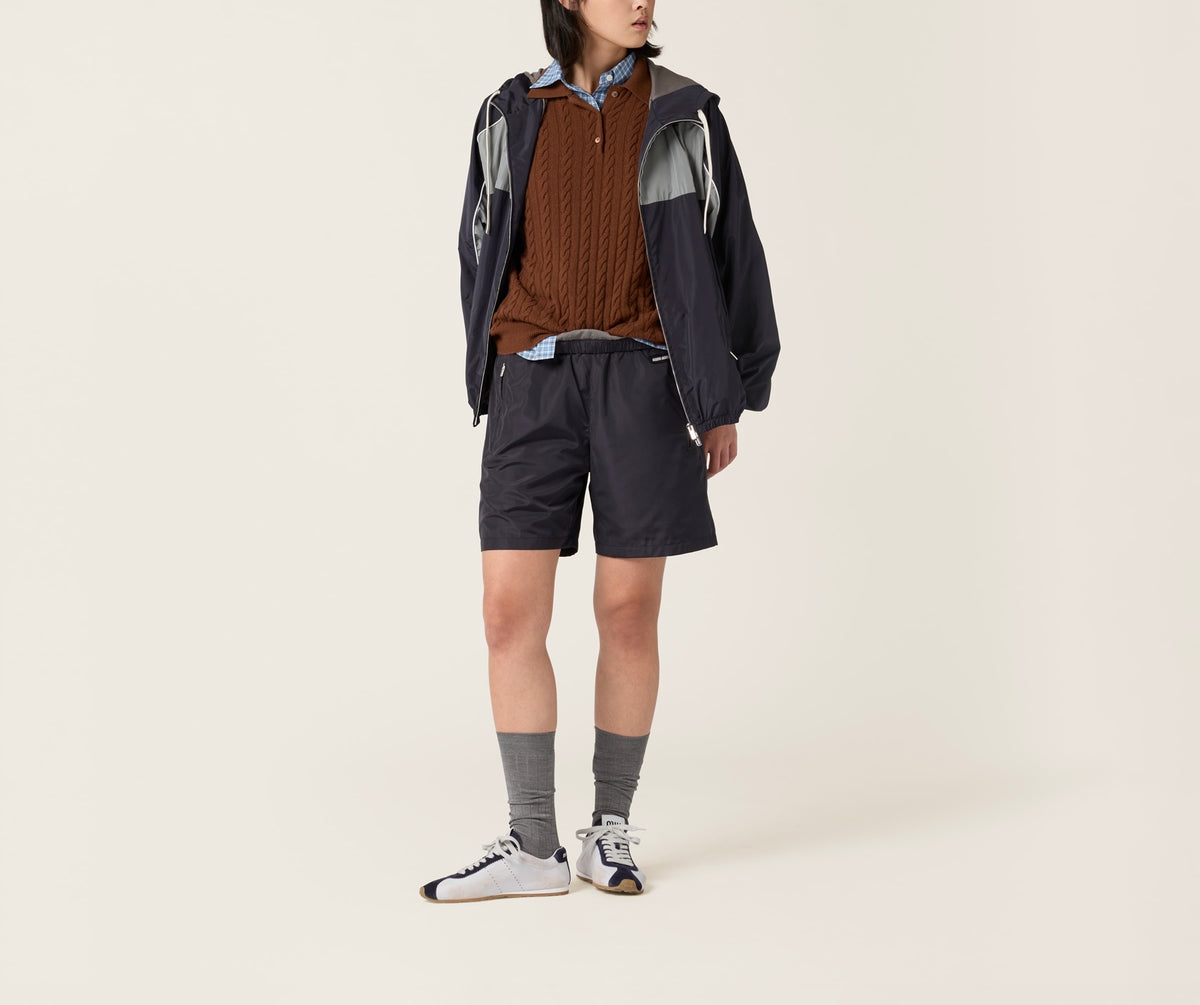 MIU MIU MP1880121GF0008SOOO,MIU MIU shorts,MIU MIU shorts 2025,MIU MIU navy shorts,MIU MIU navy shorts on sale,MIU MIU navy s
