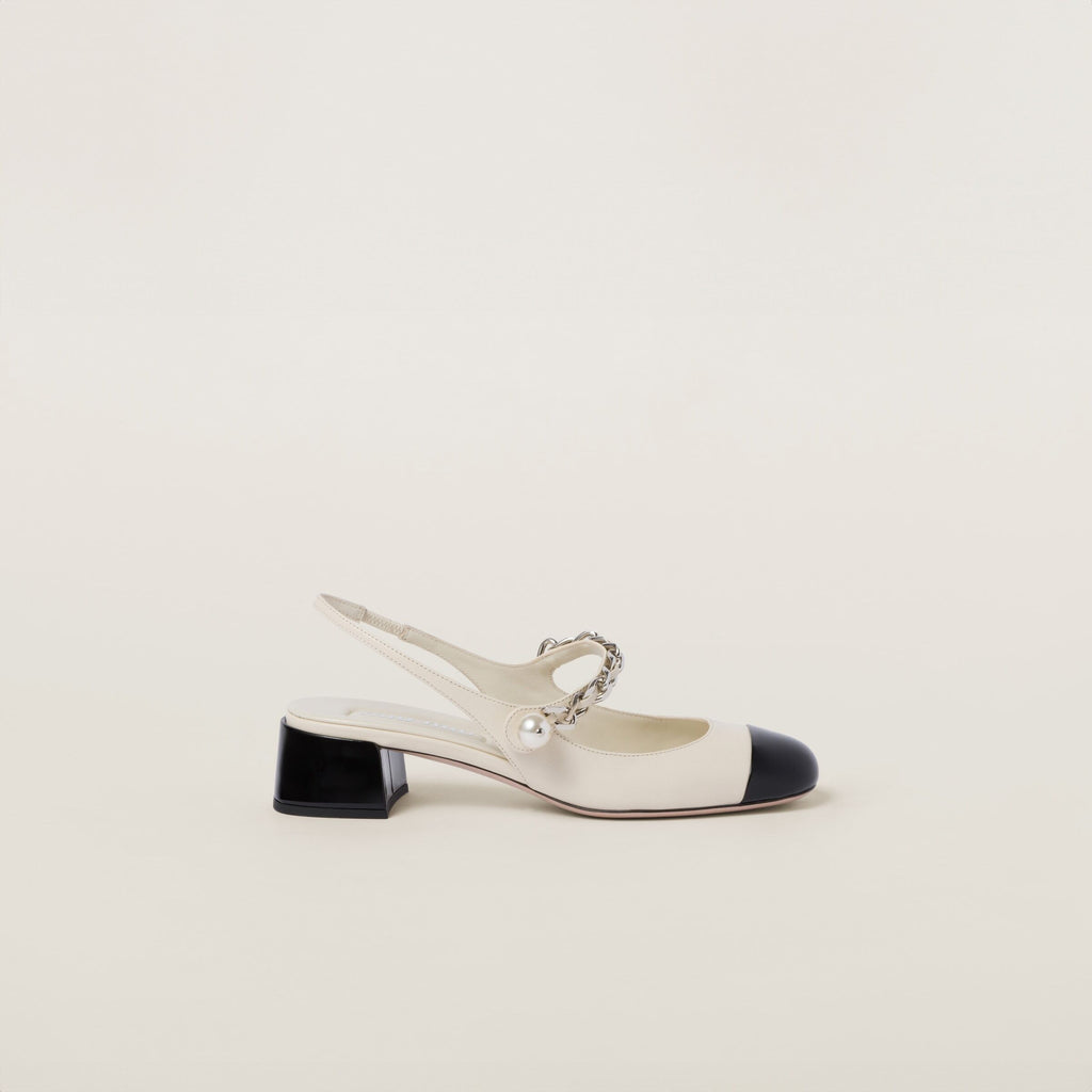 Winniemodo,Winnie modo,MIU MIU 5I045E,Miu Miu leather and patent slingback pumps,MIU MIU white slingback pumps,MIU MIU slingb