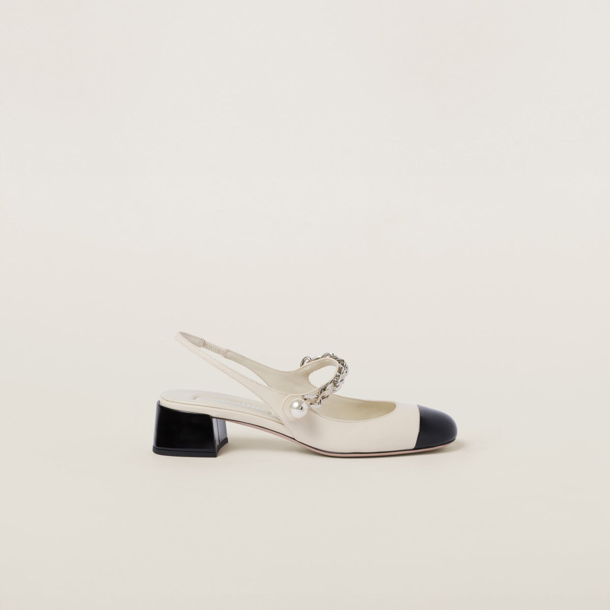 Winniemodo,Winnie modo,MIU MIU 5I045E,Miu Miu leather and patent slingback pumps,MIU MIU white slingback pumps,MIU MIU slingb