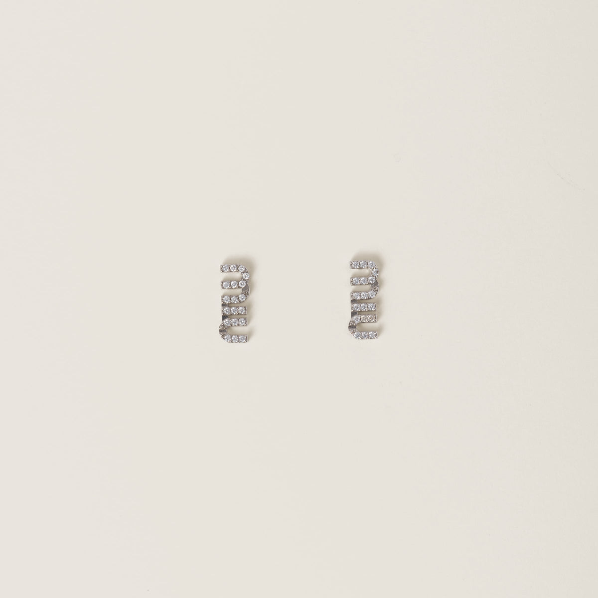 Miu Miu metal earrings with crystals,Miu Miu crystals earrings,Miu Miu silver crystals earrings,MIU MIU logo earrings,MIU MIU