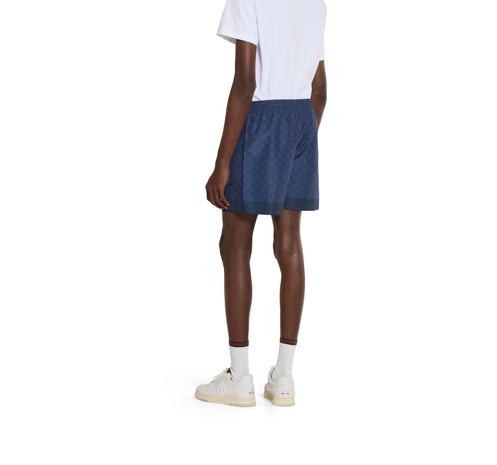 Gucci 833310 XHAKR,Gucci GG printed swim shorts,Gucci blue monogram swim shorts,Gucci blue swim shorts,Gucci swim shorts,Gucc